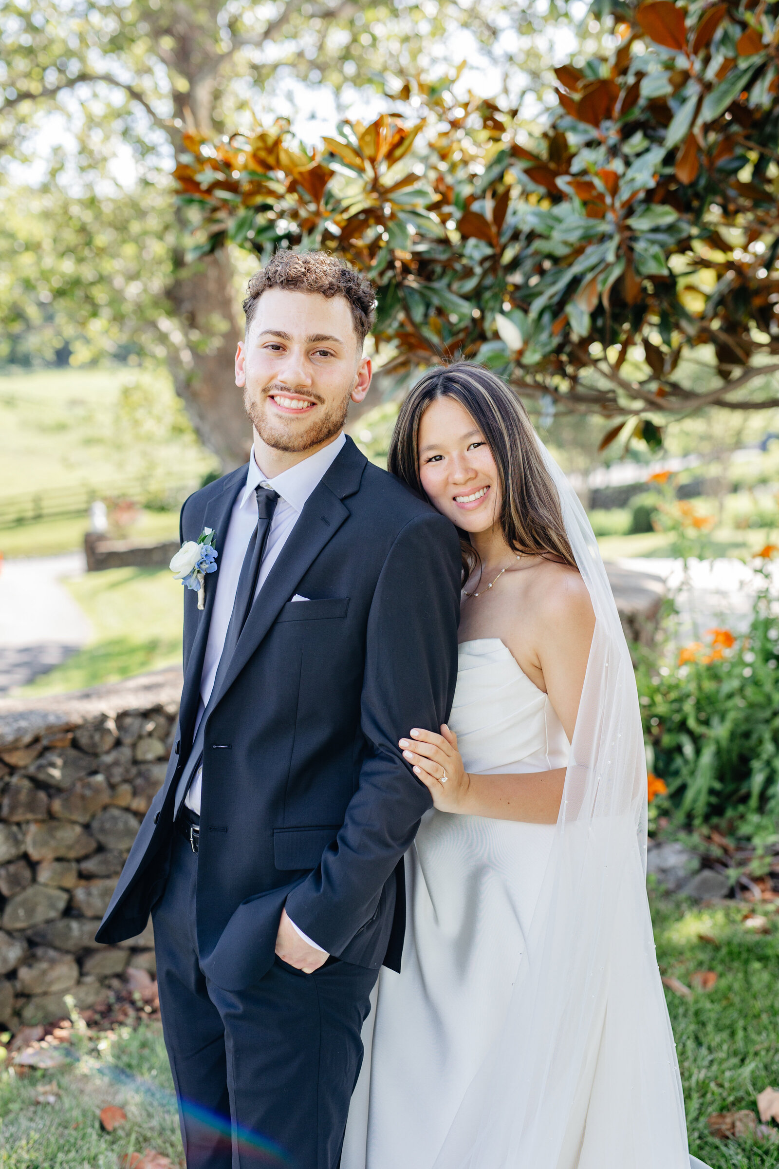 Couple smiling together in the garden at The View at Bluemont