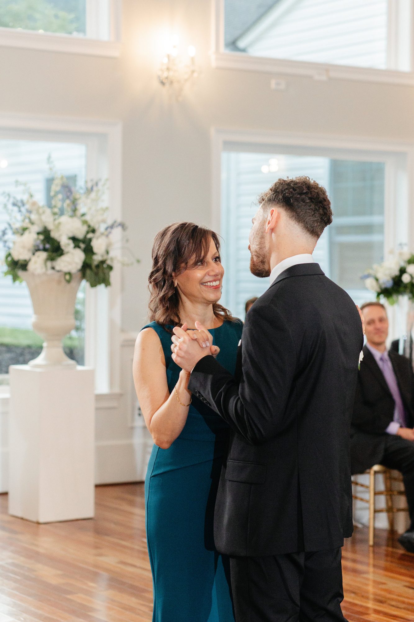 Groom dancing with his mother at The View at Bluemont