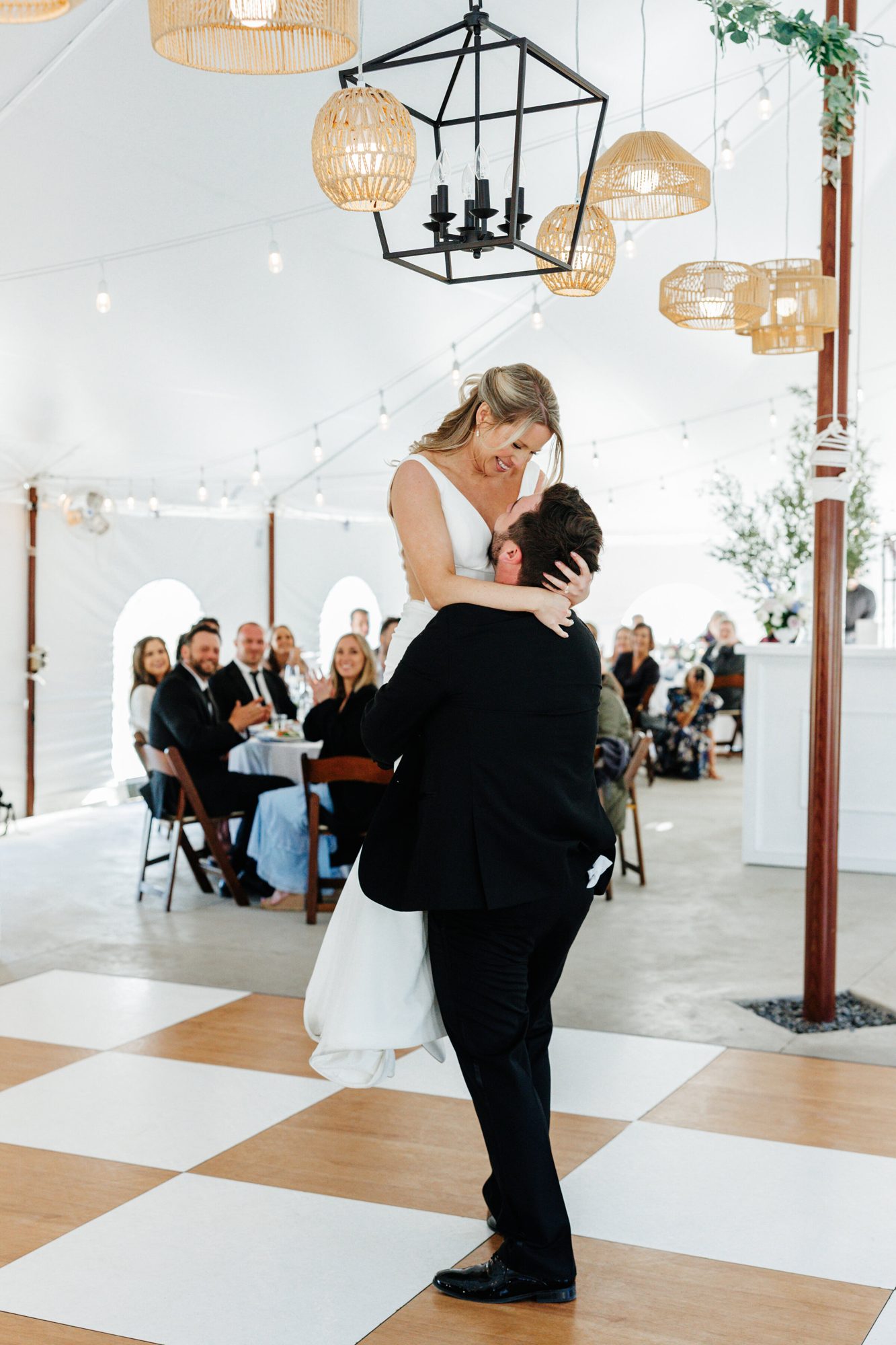 Couple dancing on the checkered dance floor at Historic Whitewood