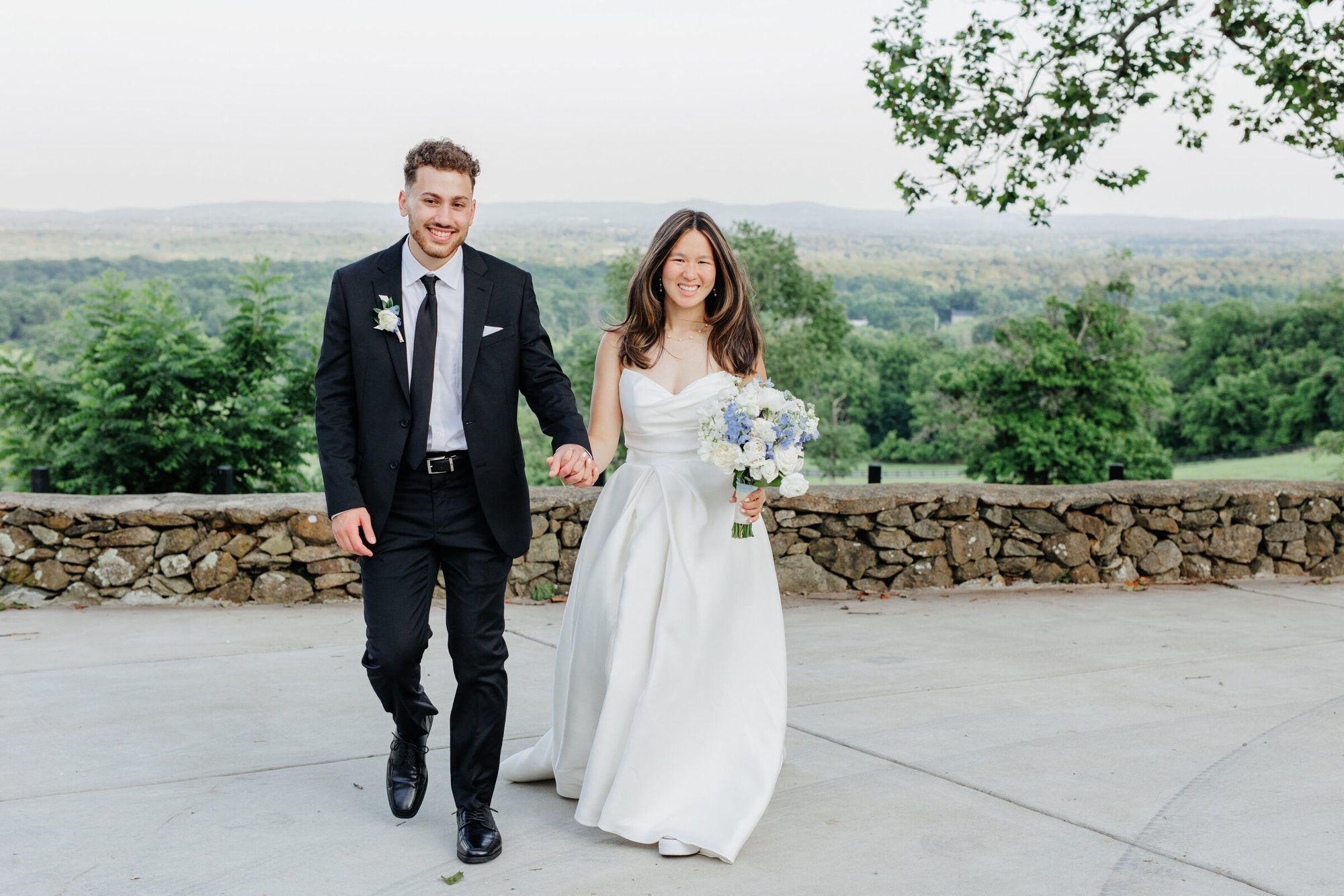 Couple walking together on the terrace at The View at Bluemont