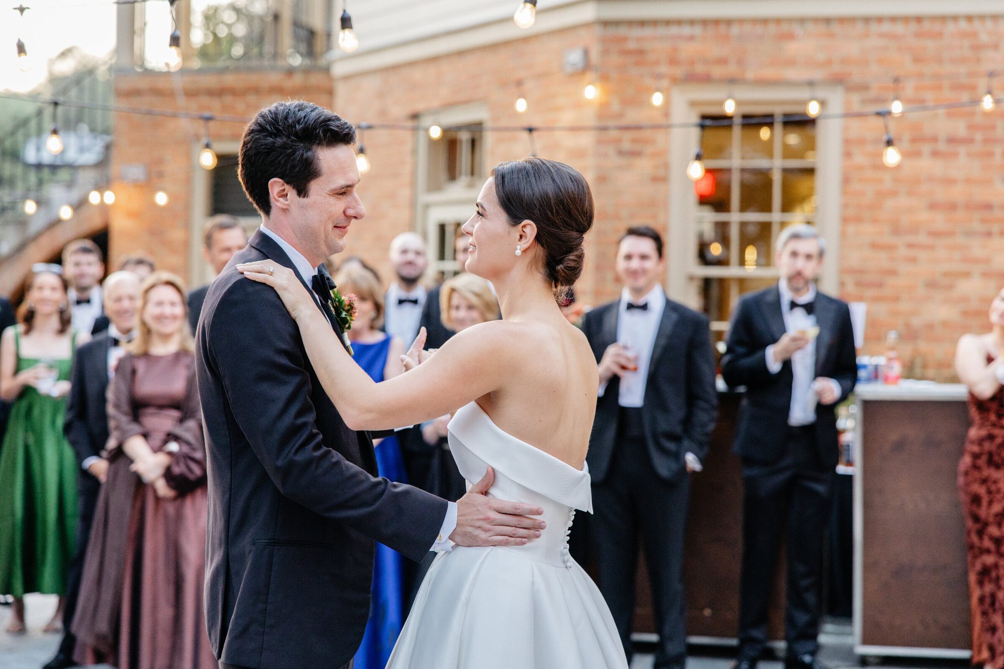 First dance on the patio as guests look on at Boars Head Resort