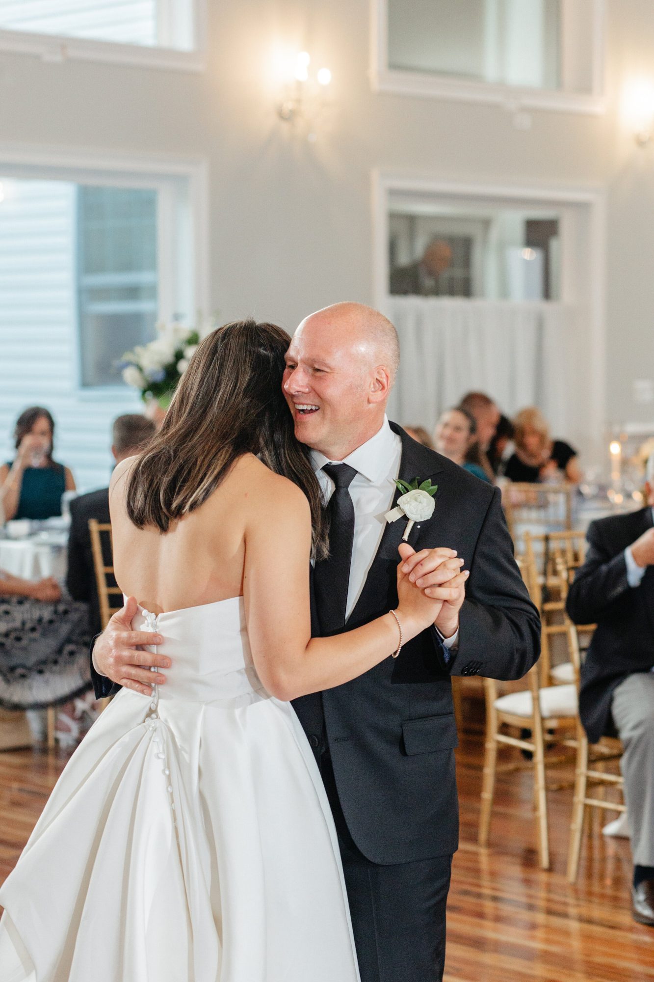 Bride dancing with her father at The View at Bluemont