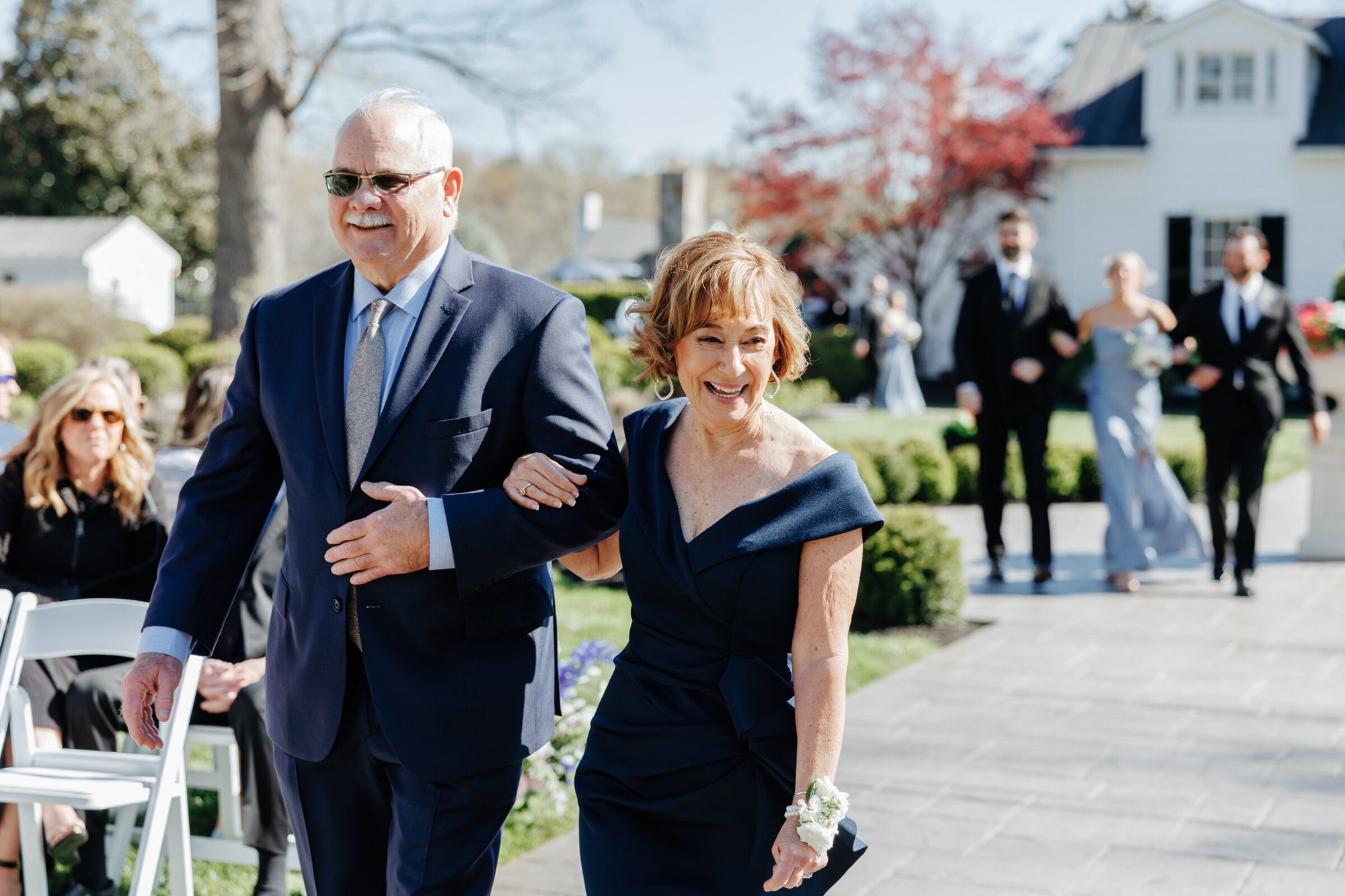 Family walking down the aisle at Historic Whitewood